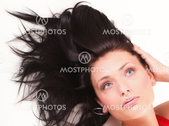 latin woman in red lying on the floor white