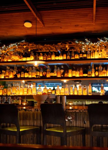 beautiful aesthetic of bar in moody fine dining restaurant