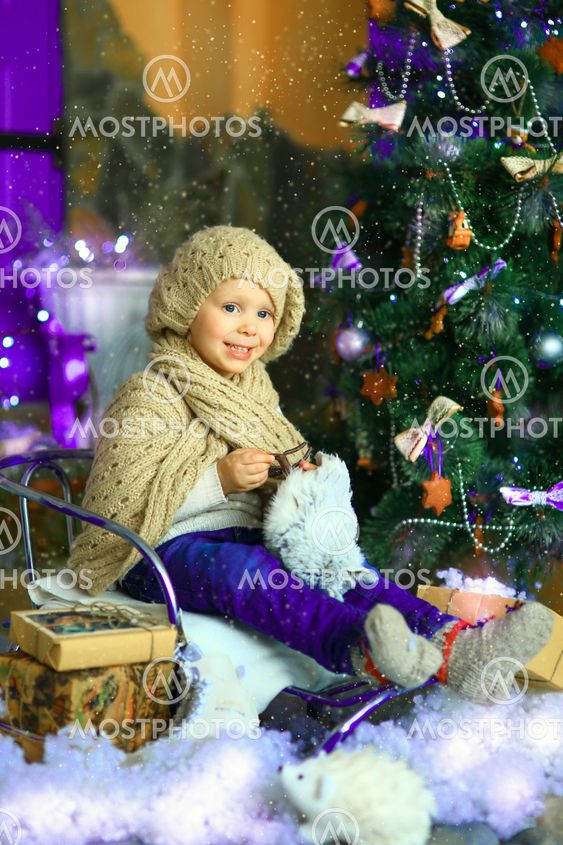 the girl near a Christmas fir-tree 5