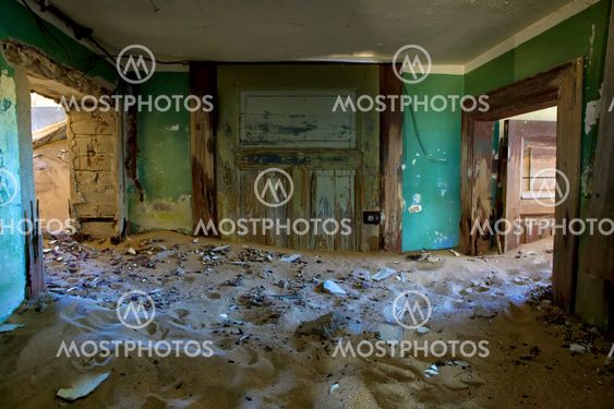 house full of sand in kolmanskop namibia