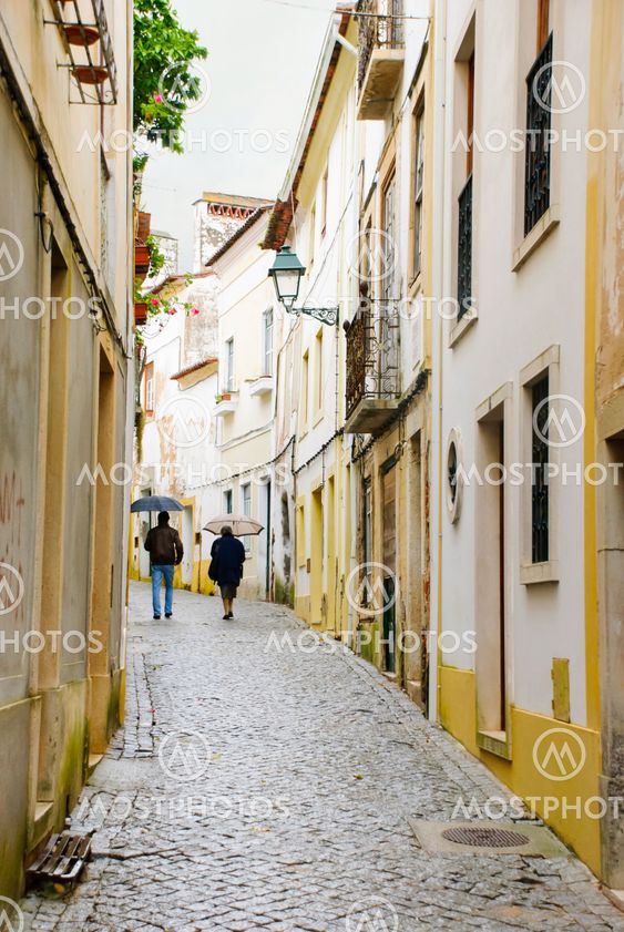 People on the street with umbrellas