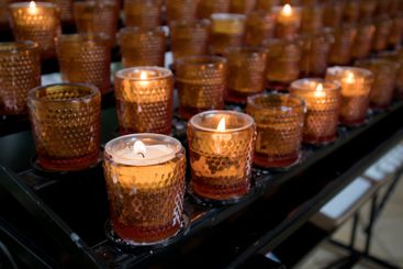 Religious and Christian objects and candles on the...