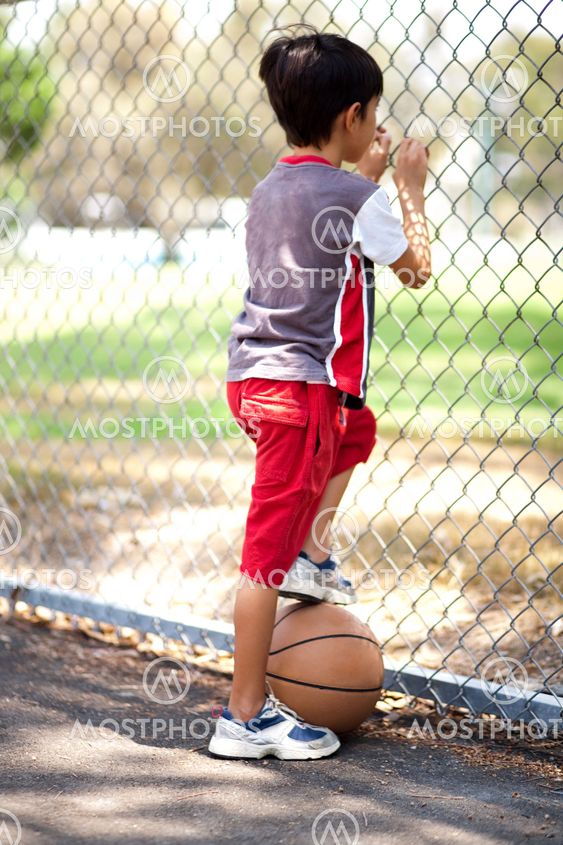 Rear view of young basketball player
