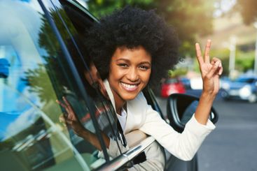 Happy, portrait and woman in car with peace sign and joy...