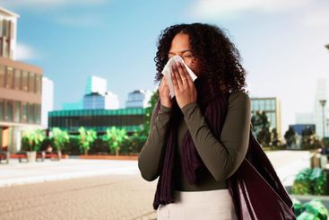 Woman With Allergy Outside In Spring