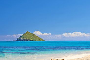 Seascape, blue sky and island in ocean for travel,...