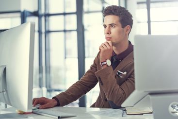 Thinking, computer and reading with business man in...