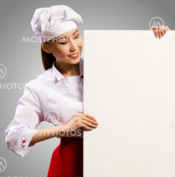 female chef holding a poster for text
