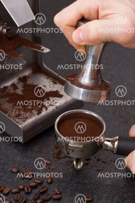 Preparing espresso beans.