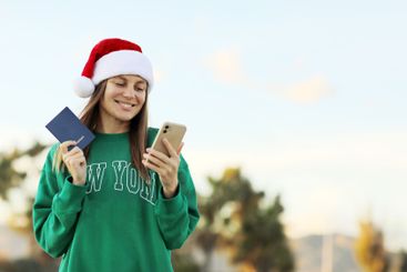 Season winter vacations. Smiling attractive woman in...