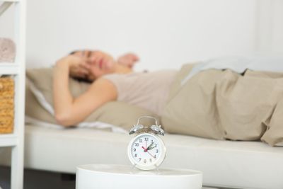 young woman wakes up early monday morning