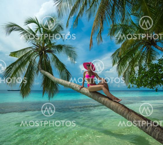 Beautiful woman in bikini on the Paradise island