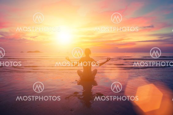 Sunset yoga on the beach, abstract photo about healthy...