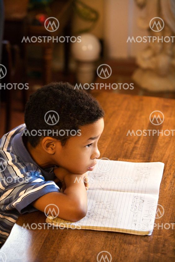 Boy doing homework.