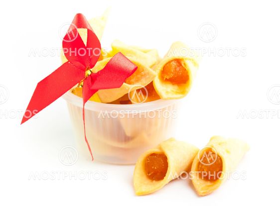 Cookies with pineapple jam on the white background