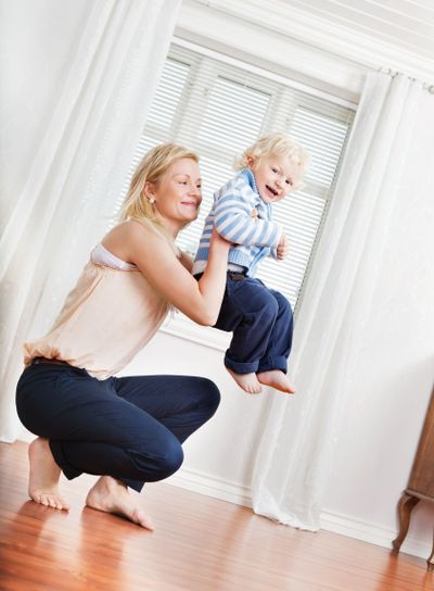 Mother playing with boy