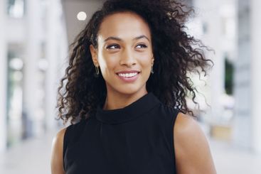 Office, lobby and businesswoman with smile for thinking,...