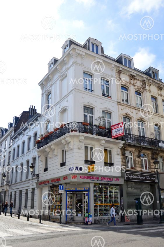 Brussels, Belgium - April 2015: Preserved old European-style residential and commercial buildings on streets of Brussels City, Belgium