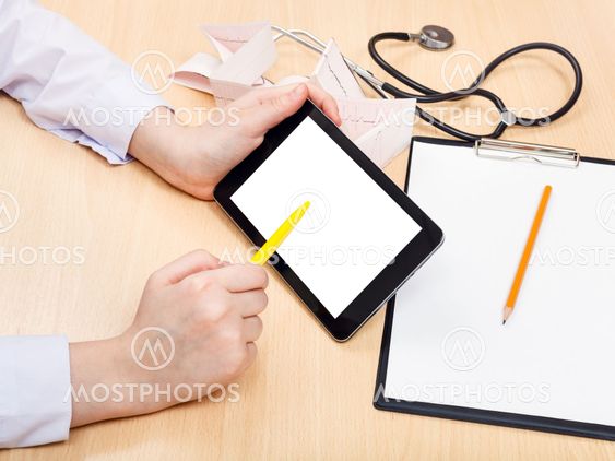 doctor works with tablet pc