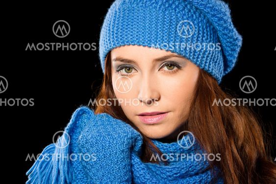 Young happy woman wearing winter cloth