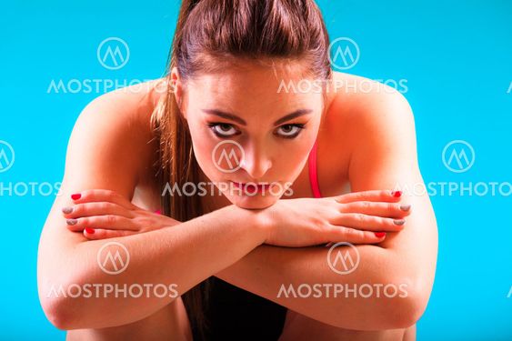 Sporty fit woman in swimming pool.