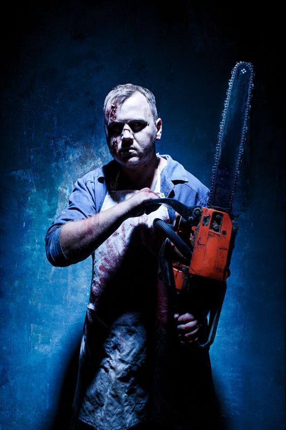 Bloody Halloween theme: crazy killer as butcher with...