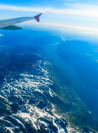 View from window of airplane flying over Norway...