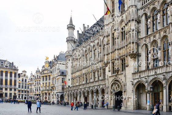 Brussels, Belgium - April 2015: Tourists visiting the Town Hall of the City of Brussels, a building of gothic architectural style from the middle ages located at the Grand Place in Brussels, Belgium