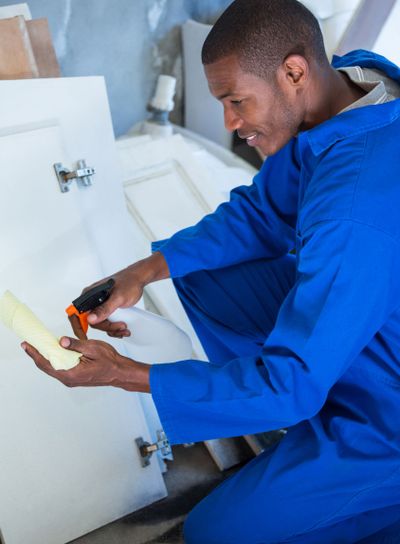 Man spraying on napkin