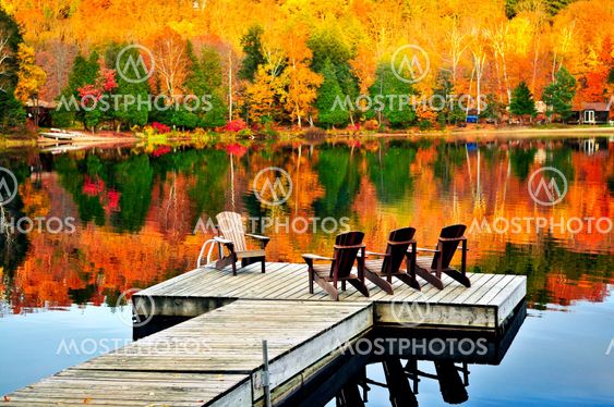 Wooden dock on autumn lake