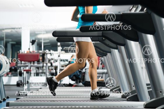 woman running on a treadmill