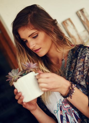 Woman, florist and flower with pot plant for garden,...
