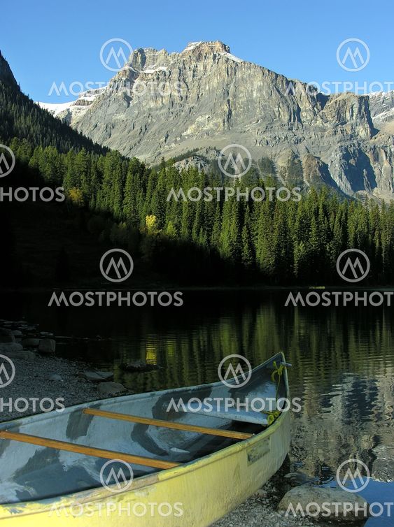 Canoe on a shore of Emerald Lake, Yoho National Park,...