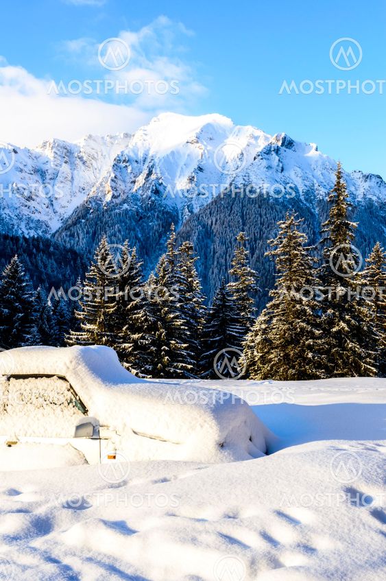 car blockaded in snow