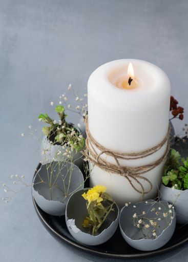 Creative handmade Easter table decoration with egg...