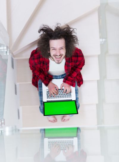 freelancer in bathrobe working from home