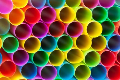 ends of multicoloured plastic drinking straws