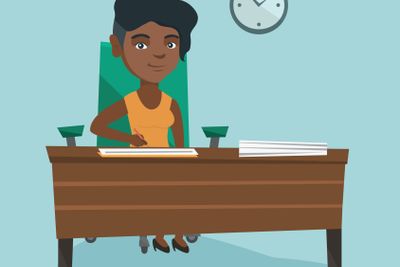 Young african business woman signing documents.