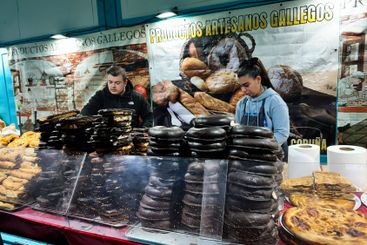 Artisanal Galician pastry stall showcasing traditional...