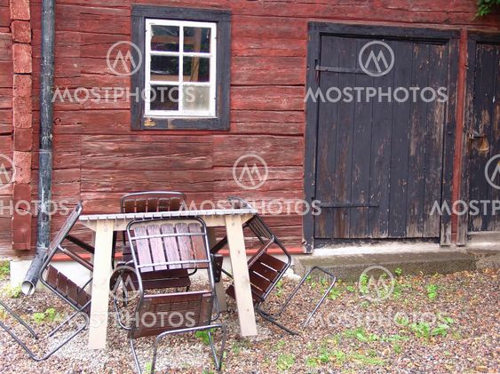 wooden house and table in front