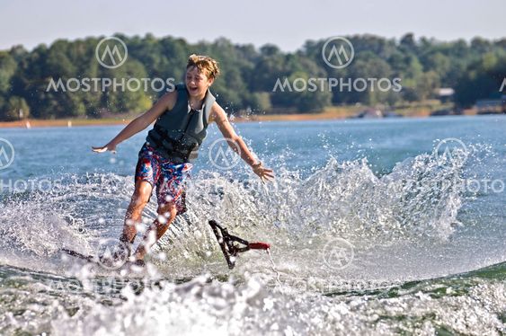 Young Boy on Trick Skies Falling