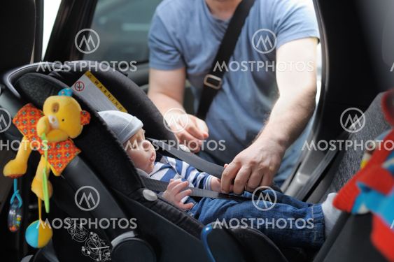 Little boy in car seat