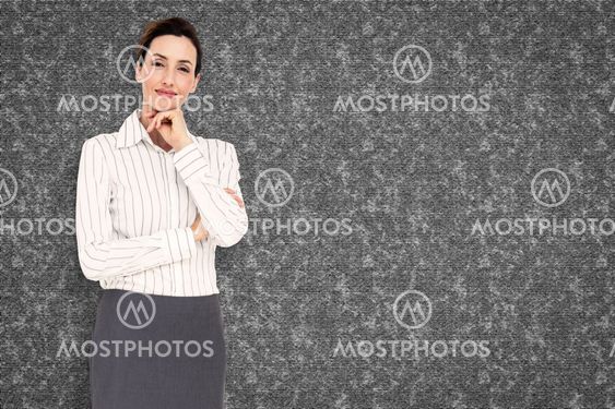 Composite image of smiling businesswoman