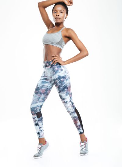 Full length portrait of a fitness afro american woman