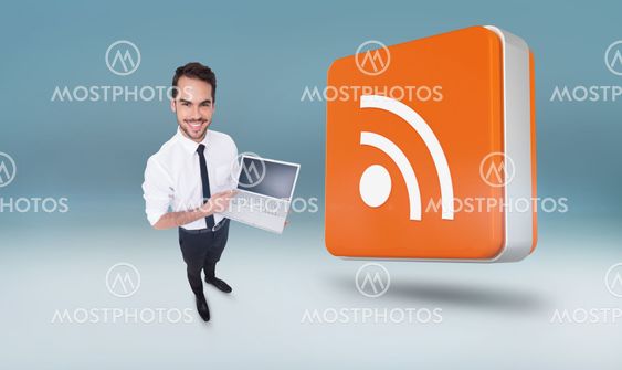 Composite image of smiling businessman pointing his laptop