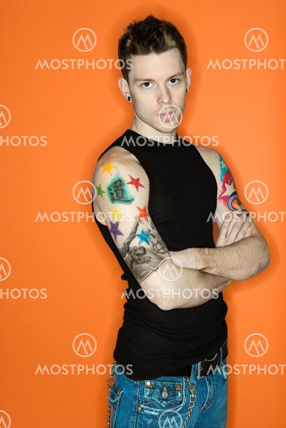 Man with tattoos.