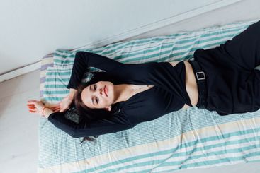 Beautiful fashionable brunette woman lying on sleeping...