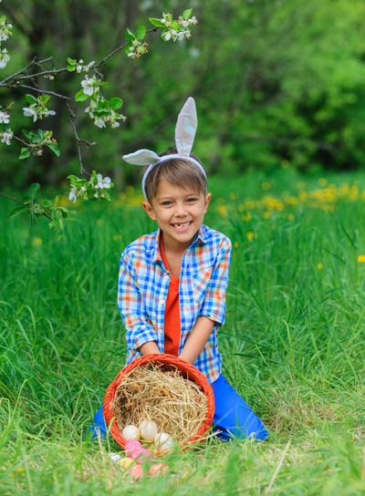 Little boy wearing bunny ears