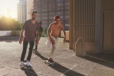 Fitness, skating and friends with skateboard, group and...