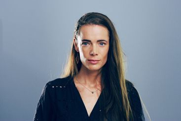 Publisher, professional and portrait of woman in studio...